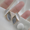 Elegant Two-Tone Leaf Drop Earrings – Nature Inspired Gold & Silver Statement Earrings for Women