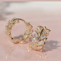 Gold Plated Olive Leaf Huggie Hoop Earrings for Women • Sparkling CZ Crystal Olive Branch Small Creoles • Dainty Leaf Ear Stacks & Cartilage Piercing Jewelry Gift